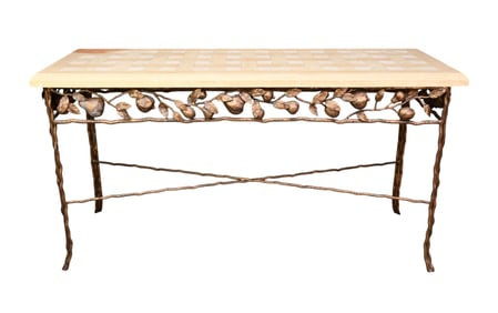 Burnish brass colored metal console with pomegranate and pear motif, stone checkerboard patterned