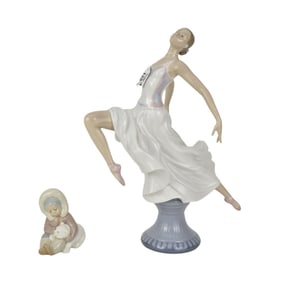 2 Lladro Pcs. Dancer (17" h x 15"w) and Eskimo Child with Polar Bear (5" h x 5" w)