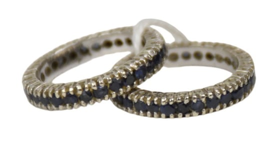 2 - 14K white Gold sapphire Eternity Bands. Size 4.5 Wt. 5.6 Grams