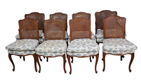 8 Country French caned dining chairs, blue coral upholstery, (some staining, some cane damage)