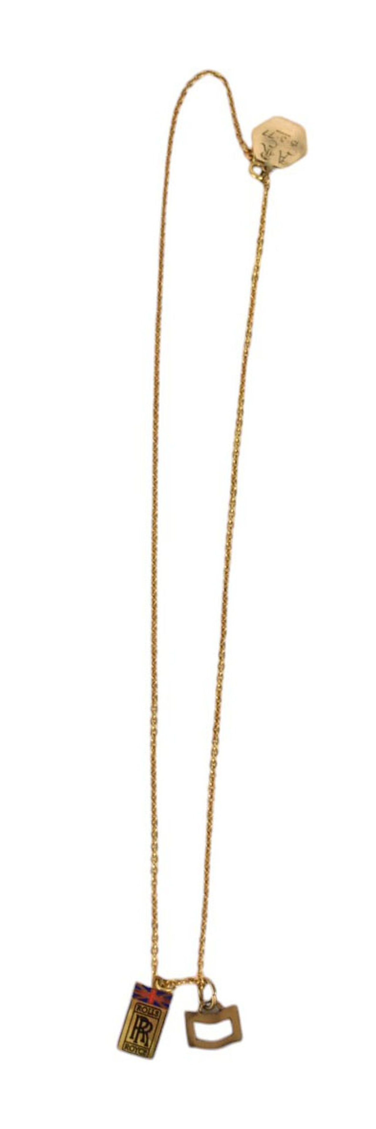 ONE 18 KARAT YELLOW GOLD ROPE CHAIN WITH THREE PENDANTS One pendant is 9 karat yellow gold with: ONE 18 KARAT YELLOW GOLD ROPE CHAIN WITH THREE PENDANTS One pendant is 9 karat yellow gold with Saint and engraved AR 15.3.77, stamped 375, one Gucci and has an open chevron style, Stamped 375 Gucci,