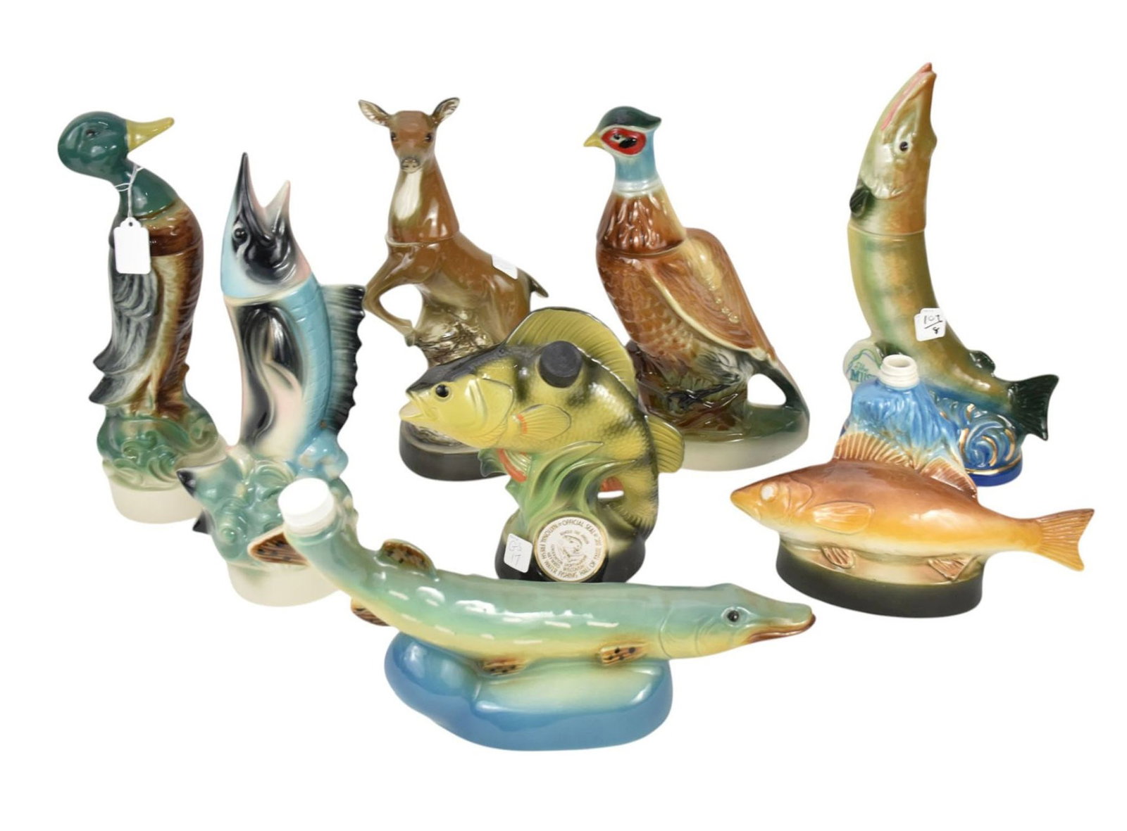 8 Porcelain "Collection of James Beam" Vintage Figural Liquor Bottles, 14'h tallest (deer head: 8 Porcelain "Collection of James Beam" Vintage Figural Liquor Bottles, 14'h tallest (deer head loose)