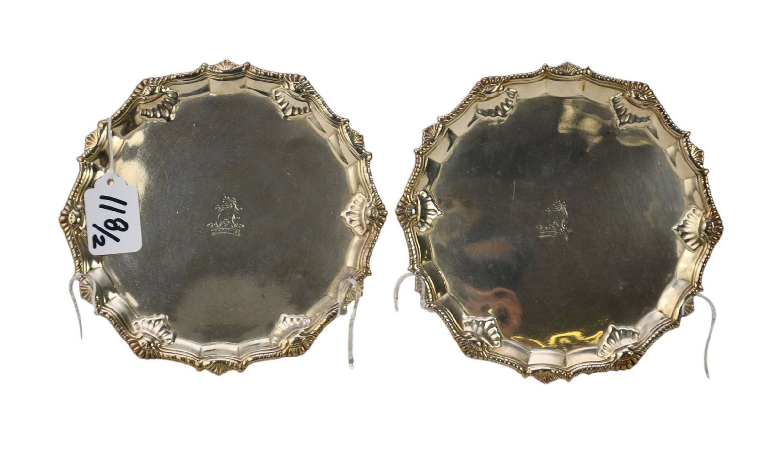 Pair of George III Sterling Silver Salvers, Circa 1770-1771, Hallmarks: Lion Passant, Crowned: Pair of George III Sterling Silver Salvers, Circa 1770-1771, Hallmarks: Lion Passant, Crowned Leopard Head, Date Letter: “P” Makers Marks: “EC,” Ebenezer Coker With shell border, three