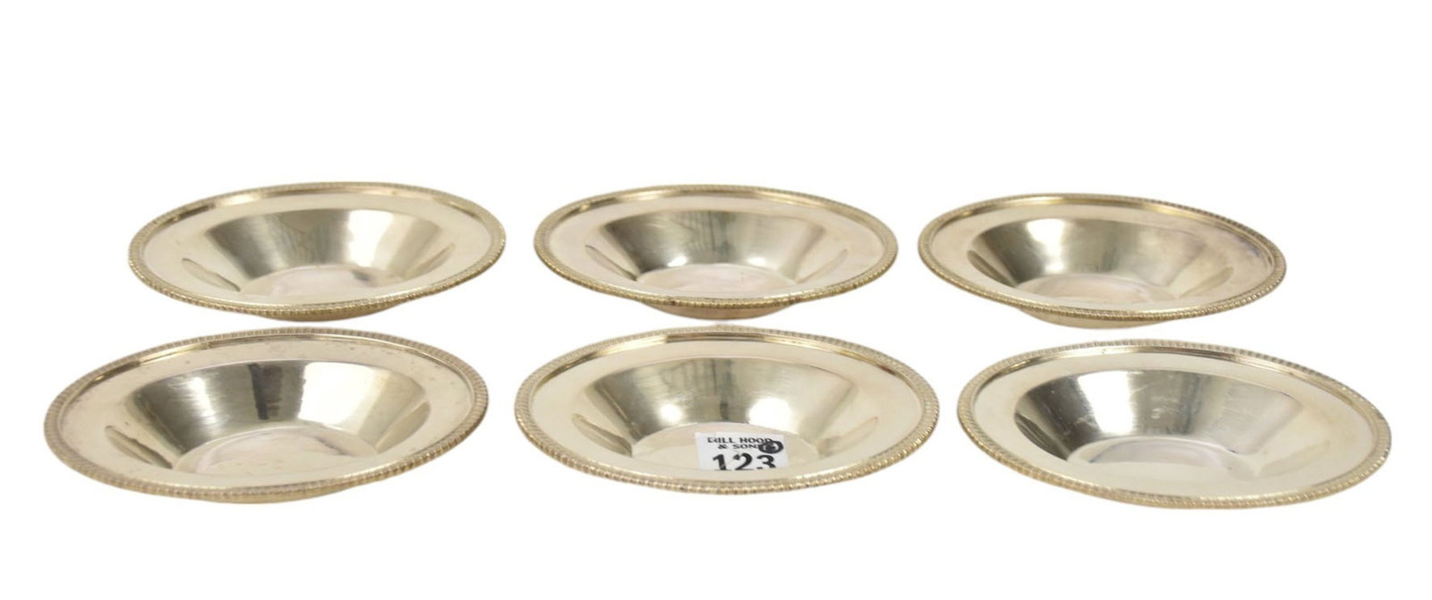 Set of Six Georgian Oval Almond Dishes, 19th/Mid-20th Century, Each with gadroon borders, Hallmarks:: Set of Six Georgian Oval Almond Dishes, 19th/Mid-20th Century, Each with gadroon borders, Hallmarks: Lion Passant, Crowned Leopard Head, Duty Mark, Date Letter: I Makers Marks: SGW, H. 3 /4” X W