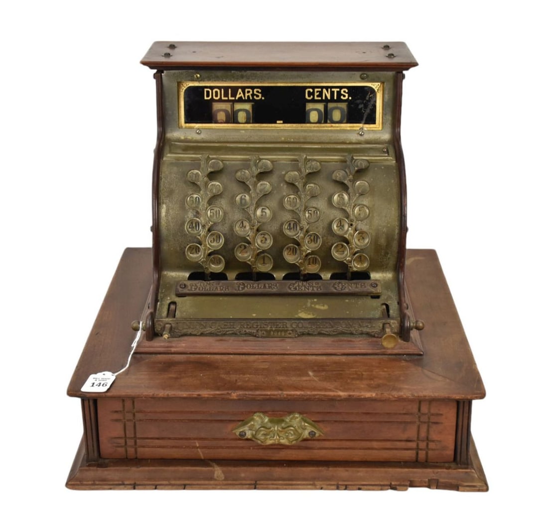 Antique Counter Top Union Cash Resister, C. 1980s - Union Cash Register Co, with wood frame and: Antique Counter Top Union Cash Resister, C. 1980s - Union Cash Register Co, with wood frame and brass hardware. With four sliding vertical vine ladder type indicators displaying "Tens of Dollars, Doll