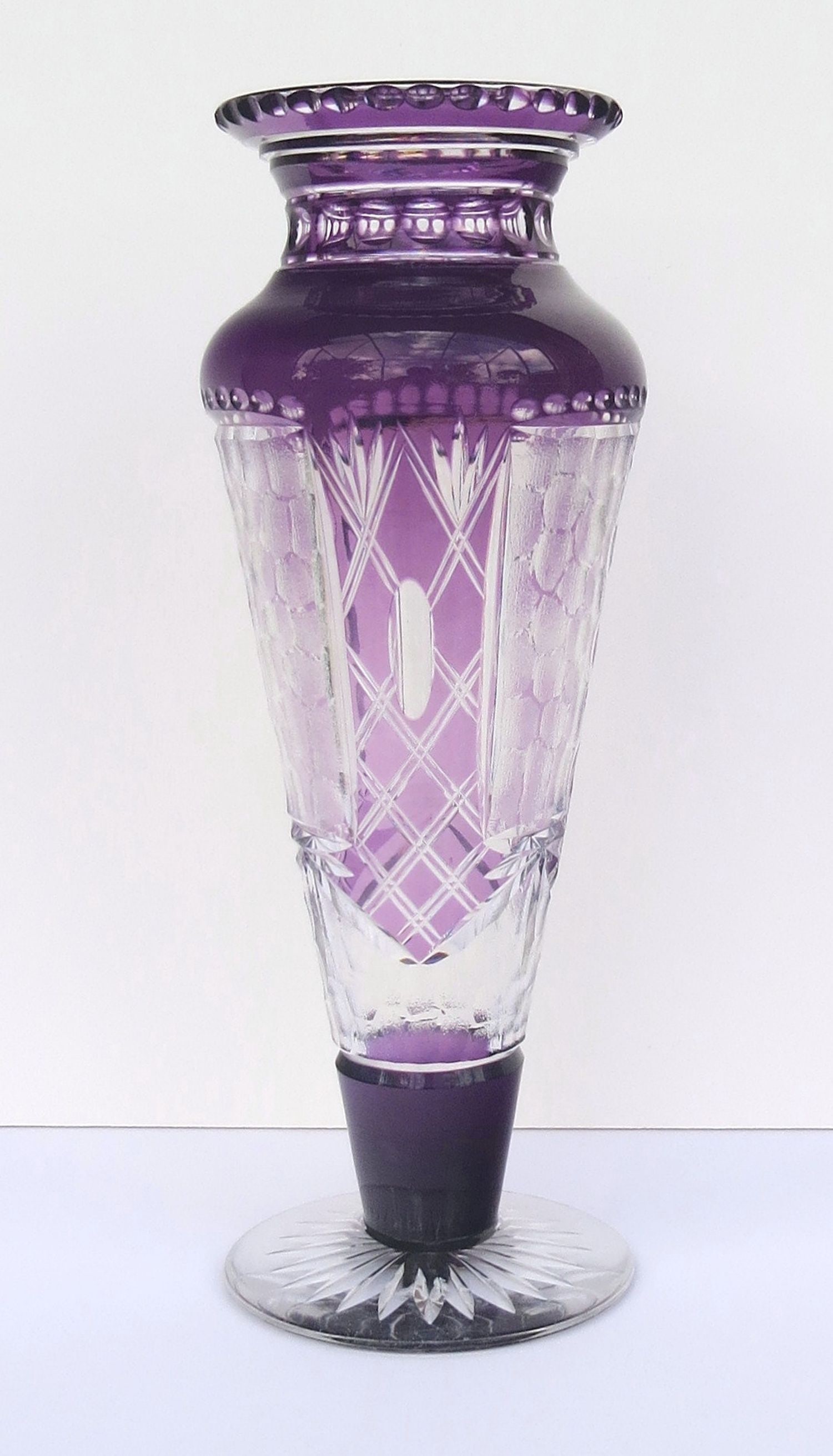 Rare WEBB Amethyst-Cut-to-Clear and Acid Etched Overlay Crystal Vase; 12 inches tall. WEBB MADE IN: Rare WEBB Amethyst-Cut-to-Clear and Acid Etched Overlay Crystal Vase; 12 inches tall. WEBB MADE IN ENGLAND acid-stamp signature under the base. A vintage piece with rare decoration and large size. Con