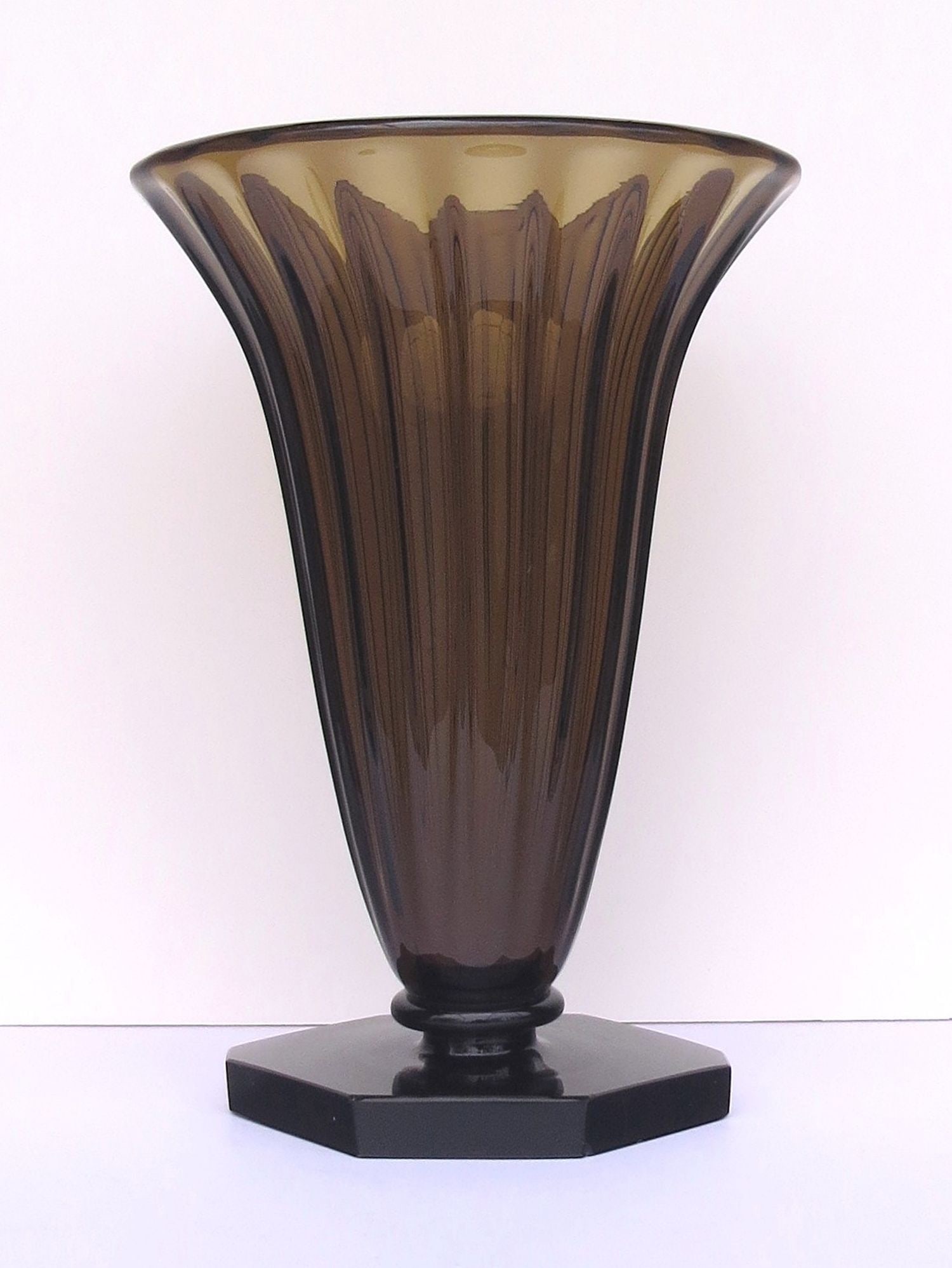 Mammoth DAUM-NANCY Hand Blown Amber Crystal Vase; ART DECO Style, circa 1920’s. The body blown: Mammoth DAUM-NANCY Hand Blown Amber Crystal Vase; ART DECO Style, circa 1920’s. The body blown with 18 deep vertical ribs flaring out widely at top; angular cut panel base; 16 inches tall; 11 &frac1