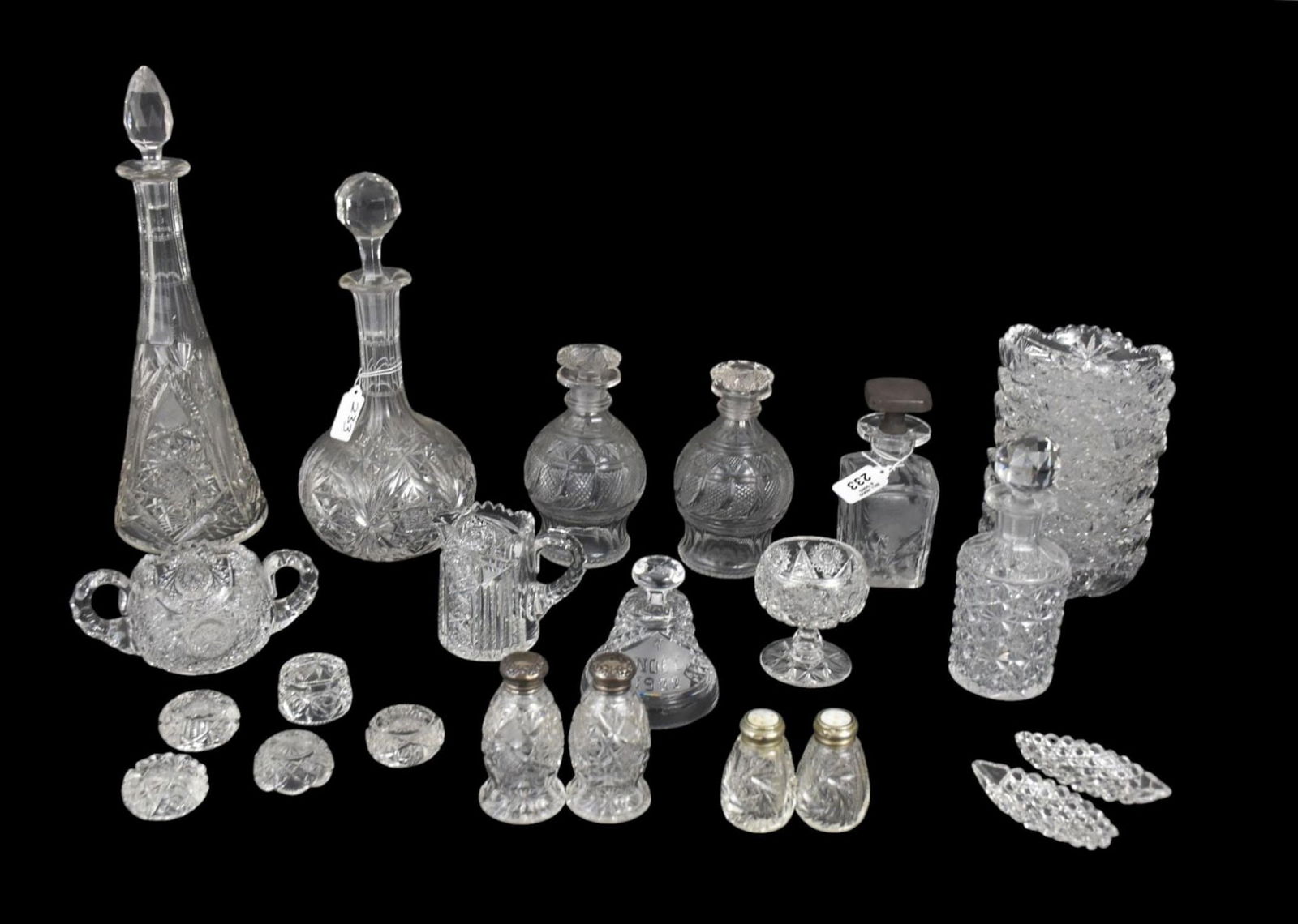 Grouping of Cut Glass, Small Decanters, Pitchers, Salt Cellars, S & P Shakers, Scent Bottle, Bell: Grouping of Cut Glass, Small Decanters, Pitchers, Salt Cellars, S & P Shakers, Scent Bottle, Bell Nappies and 2 Large Cut Glass Decanters