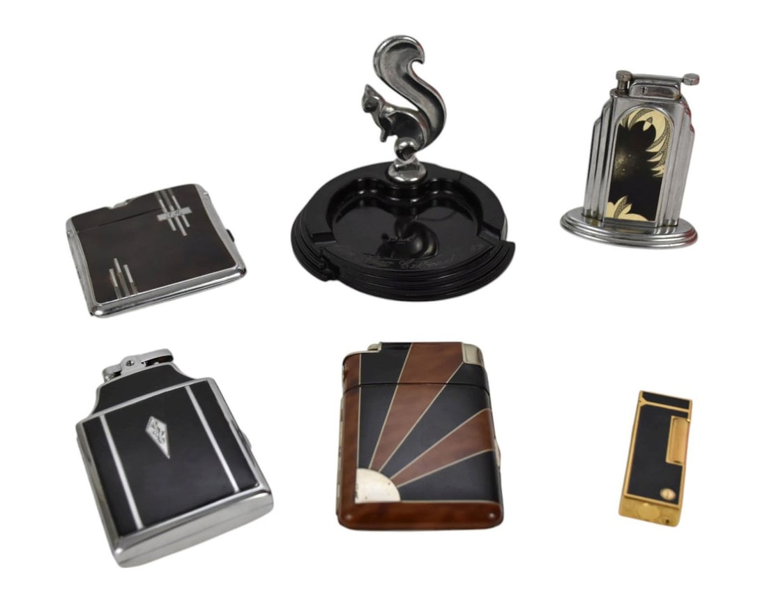 Collection of Art Deco Period Smoking Accessories, C. 1930s - A collection of vintage Art Deco: Collection of Art Deco Period Smoking Accessories, C. 1930s - A collection of vintage Art Deco cigarette case lighters, lighters, and an ashtray. Comprising: A) Elgin Otis table top lighter with black