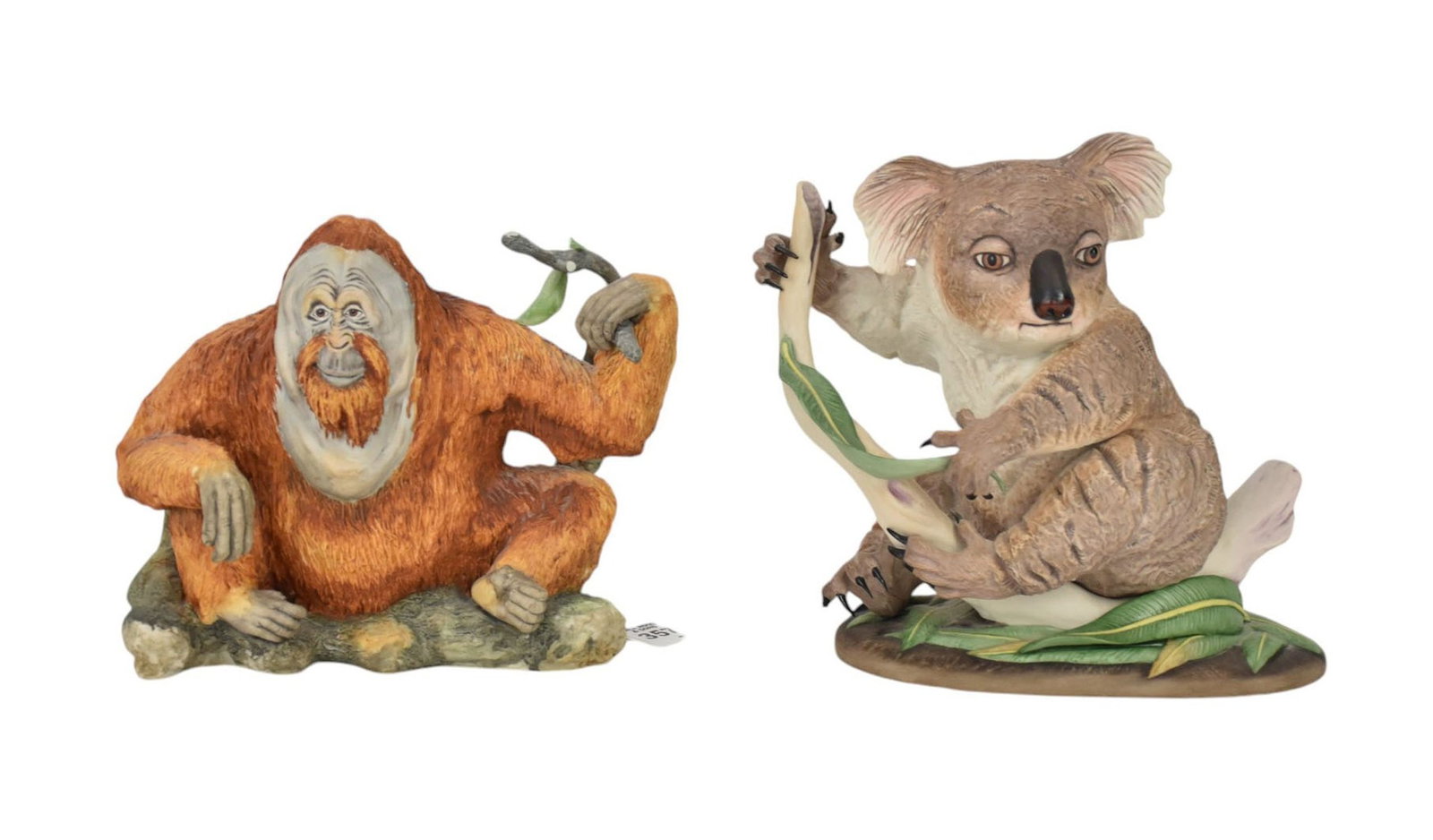 Two Boehm Porcelain Figurines, Orangutan & Koala Bear - Two hand-painted bisque porcelain wildlife: Two Boehm Porcelain Figurines, Orangutan & Koala Bear - Two hand-painted bisque porcelain wildlife animal figures. Comprising: Orangutan, #200-36, c. 1977, Boehm Studios Malvern, England, 7.5" h x 7.5