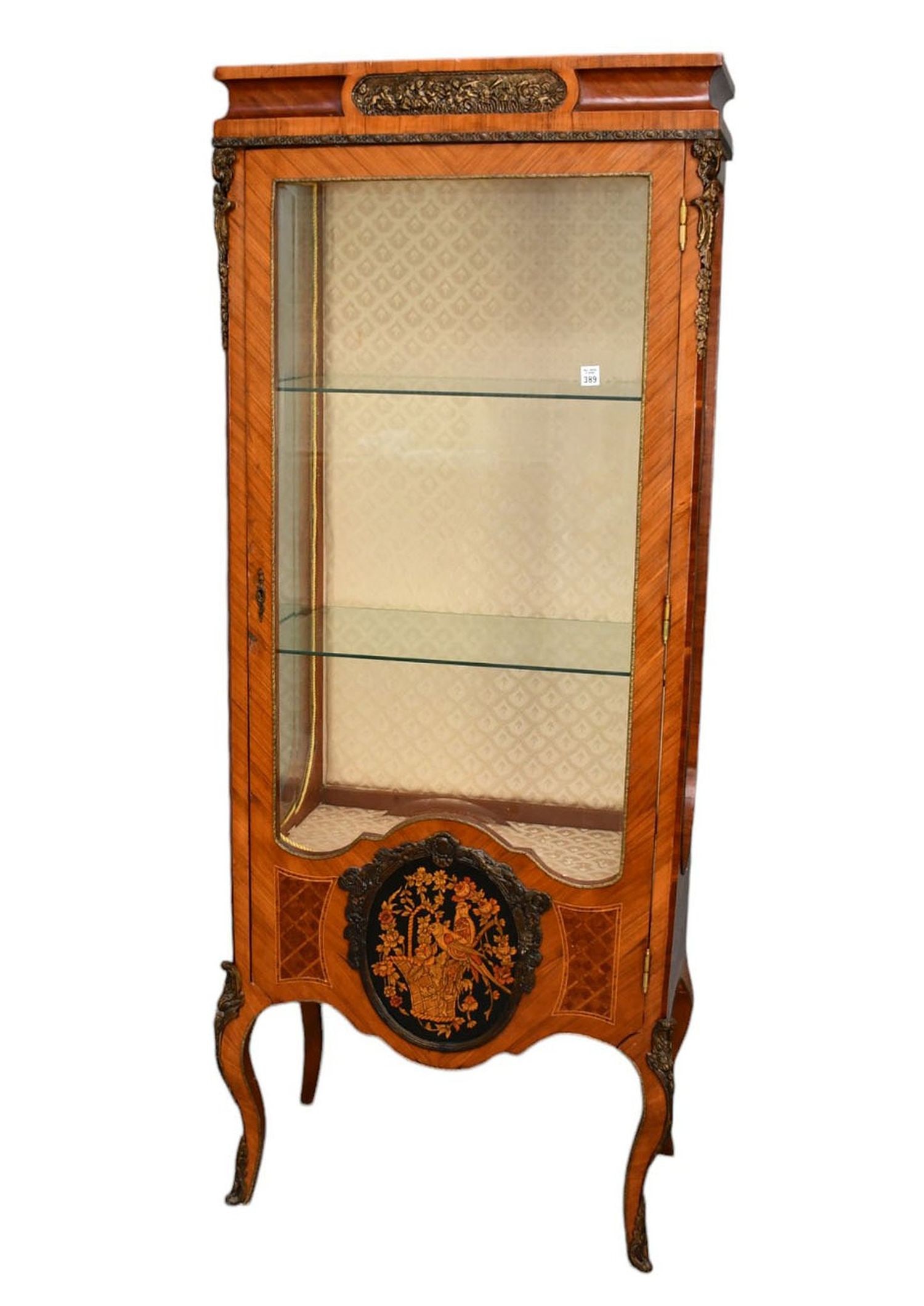 Vitrine with Beveled Glass, Single Door and 2 Glass Side Lights, Fabric Interior with Shelves,: Vitrine with Beveled Glass, Single Door and 2 Glass Side Lights, Fabric Interior with Shelves, Painted Framed Medallion at Bottom, Metal Mounts, 72"H x 29"w x 16"d