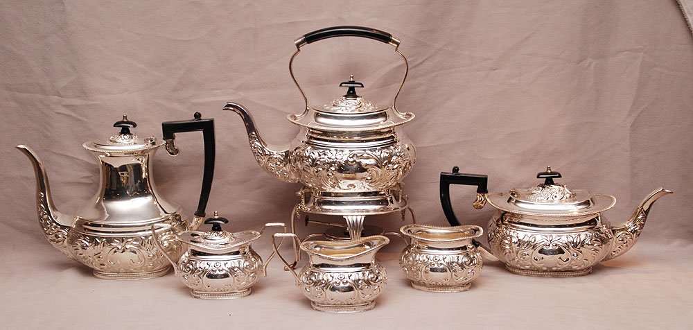 7 pc. Sheffield silver plate tea service, English : 7 pc. Sheffield silver plate tea service, English Victorian, incl; tray, coffee pot, teapot, hot water kettle with burner, sugar, creamer and waste bowl