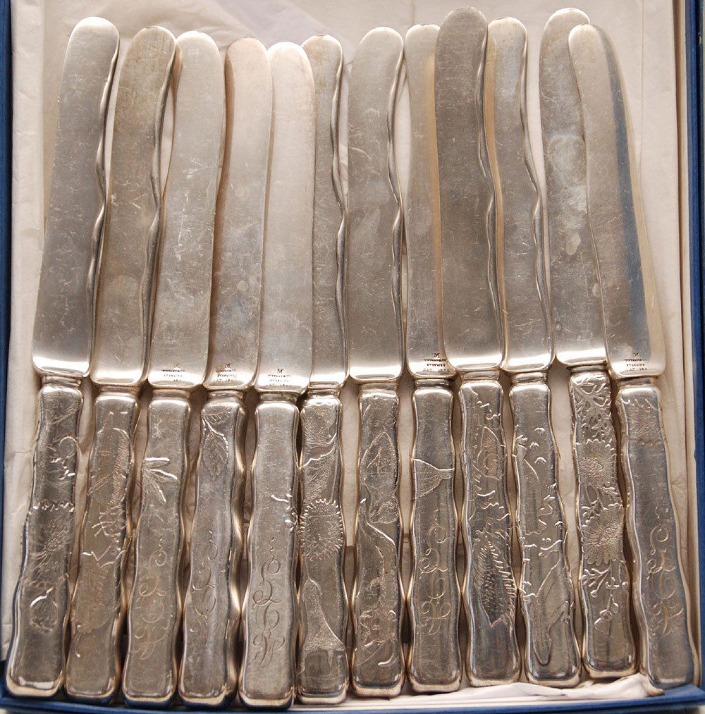 12 Tiffany & Co. knives: Set of 12 rare Tiffany & Co. Lap Over Edge sterling silver dessert knives, monogrammed ADG, blades are sterling, marked M, handles etched with flowers, animals,25.5oz