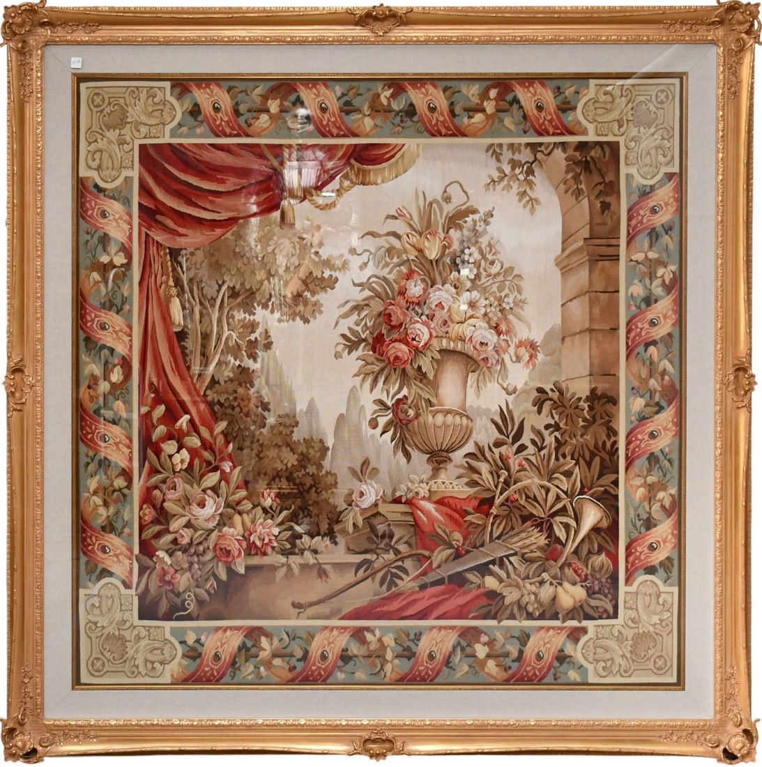 AUBUSSON TAPESTRY framed under Plexi, Urn and floral in landscape.  Approx. 60 inch square in gilt (1 of 11)