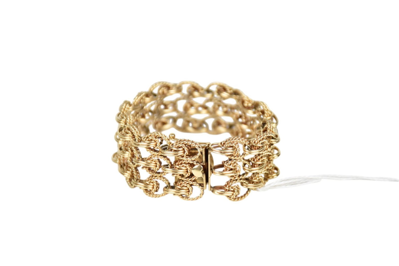 14K Yellow Gold Bracelet. Unique entwined spiral rope design. Length 7" width 1" wt. 52.5 grams: 14K Yellow Gold Bracelet. Unique entwined spiral rope design. Length 7" width 1" wt. 52.5 grams