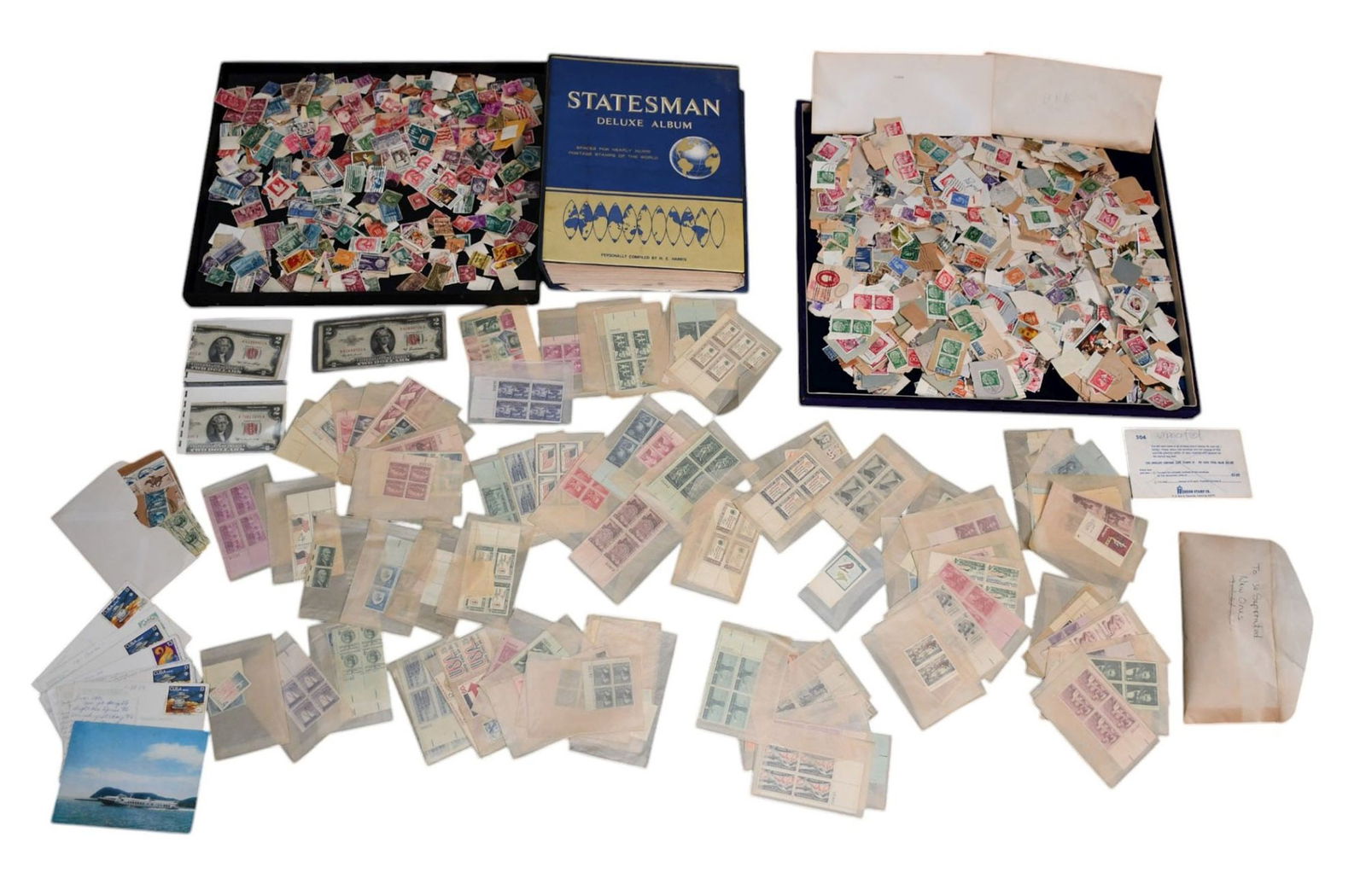Estate Stamp Lot of unused US stamps in protective wax slips / statesman deluxe stamp album /  large (1 of 18)