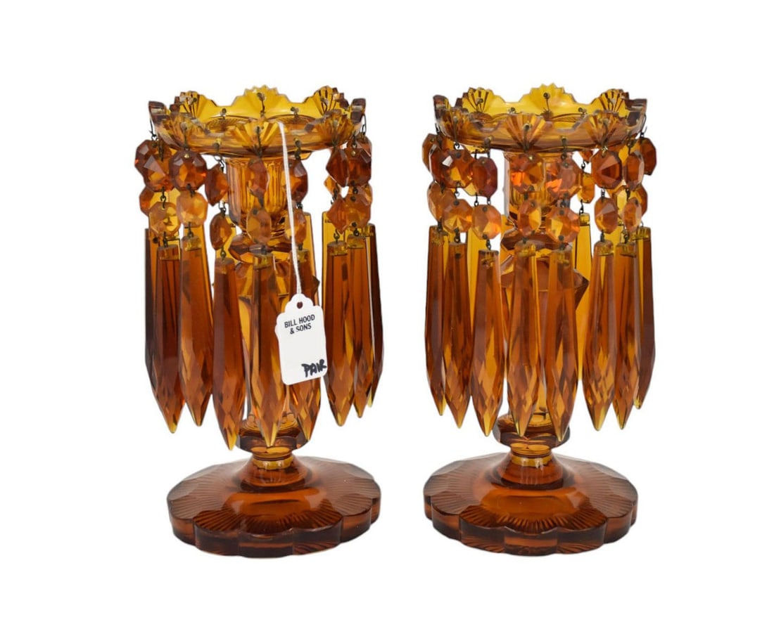 Pair Victorian Amber Cut Glass Mantle Lusters - A pair of amber-colored cut glass mantle lusters or: Pair Victorian Amber Cut Glass Mantle Lusters - A pair of amber-colored cut glass mantle lusters or candleholders, each with fan-shaped saw-toothed edge at top and amber hanging faceted prism crystals