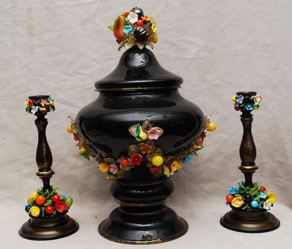 3pc. Italian Murano covered compote & candlesticks: 3pc. Italian glass covered compote with applied glass flower swags (17"h), along with pair of matching candleholders, 10 1/2"h small damage on handle of lid