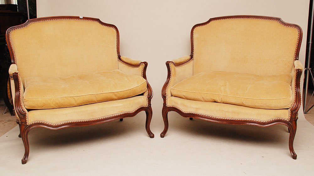 Pair camel color velvet settee with mahogany frame: Pair camel color velvet settee with mahogany frames, some fading and some arm wear, mahogany a little rough in some spots, 39"h x 39"w, seats are 36"w x 23"deep