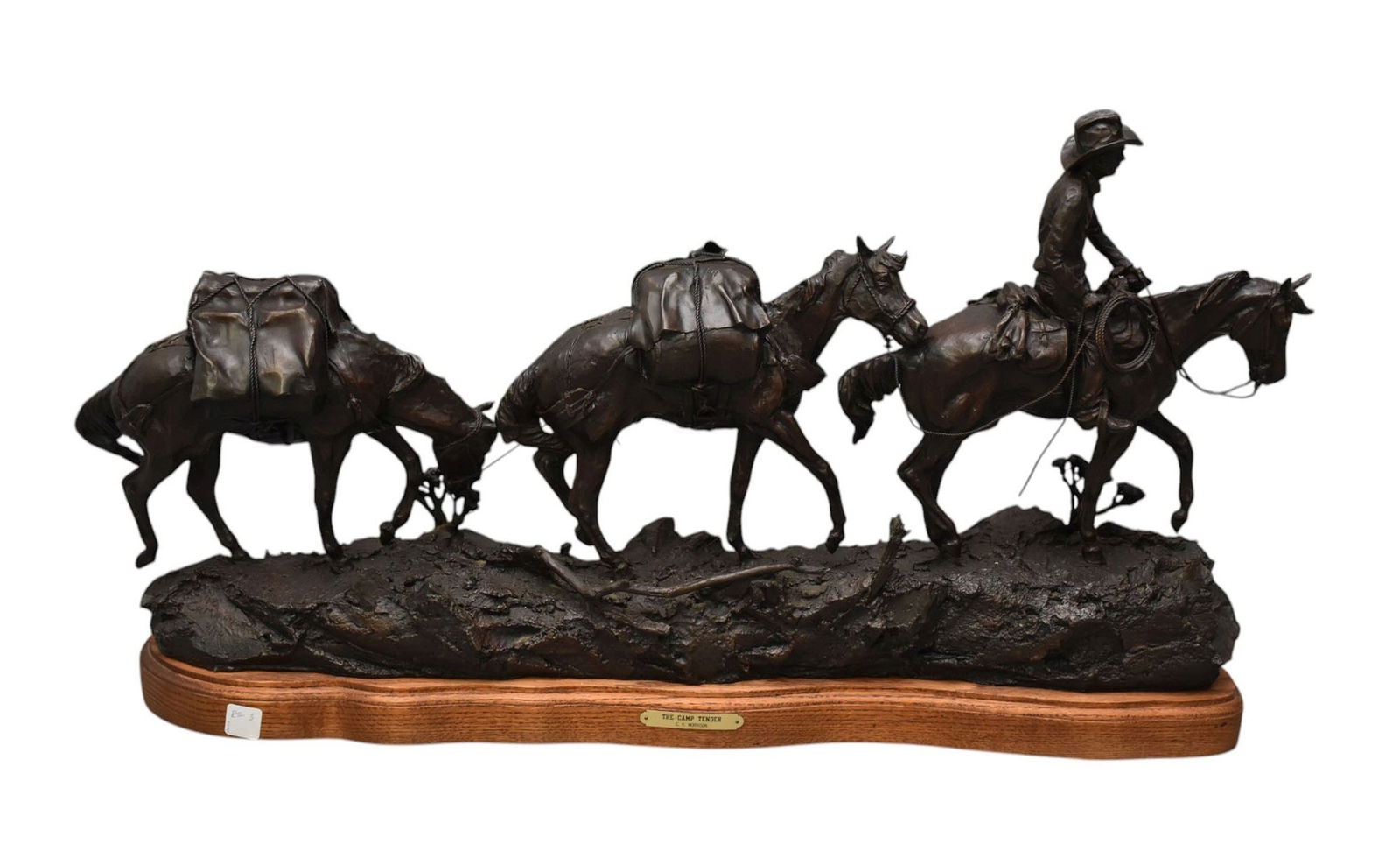 Clarence R. Morrison (American, 20th Century) Bronze Group "The Camp Tender" - A patinated bronze (1 of 8)