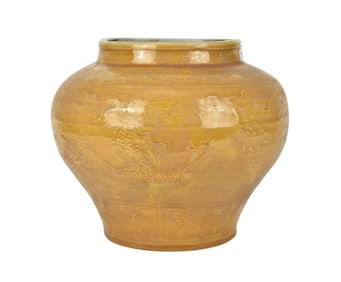 Chinese Yellow Glazed Jar with Relief Decoration - A Chinese porcelain / stoneware jar. With a