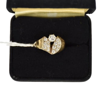 14K Yellow Gold Diamond Ring. Size 8 wt. 8.9 grams, center diamond 1/2 carat with 13 paved diamonds