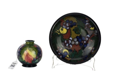 A Moorcroft Vase & Royal Stanley Bowl, Leaf & Berries Motif - Two English pottery items. Comprising: