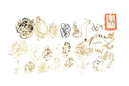 Costume Jewelry Lot.  Pearls and mother of pearl necklaces, earrings, bracelets etc. Some signed