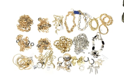 Costume Jewelry Lot. Gold & Silver tone costume jewelry lot. Necklaces, Earrings, and Bracelets.