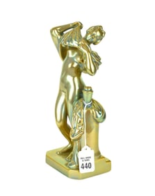 ZSOLNAY Iridescent Green Female Figure, 20th Century, The female figure removing her garments and