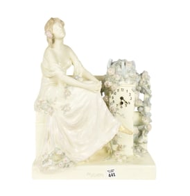An Art Nouveau Porcelain Figural Table Clock by RUDOLF PODANY, Late 19th Century, Mignon, Depicting