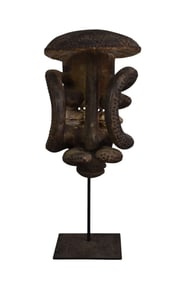 A Bete Tribal Mask, Ivory Coast, Africa - A face mask, carved from a single piece of wood, with dark