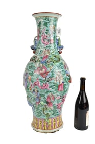 Antique Chinese Famille Rose Vase with Dragons in Relief - A porcelain vase decorated in famille