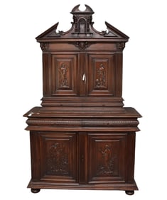 A Walnut Buffet à Deux Corps, French, 1670, A broken pediment top over two carved panel doors and