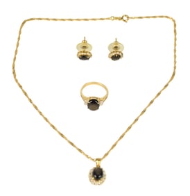 14K Yellow Gold Black Star Sapphire Zirconium Jewelry Set. Ring size 7, earrings studs .5" and