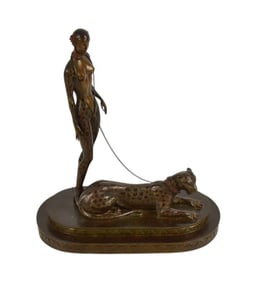 Erte 'La Femme a La Panthere' Bronze Sculpture - C. 1981. A patinated bronze sculpture by Erte