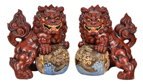Pair Japanese Foo Dogs, 20th c, Oxblood Color with Satsuma Orbs,  15"h x 11"w