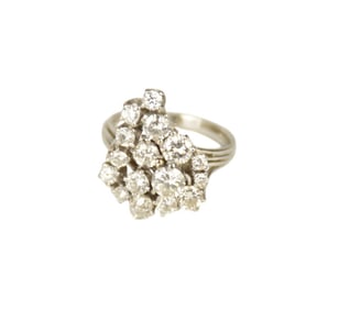 18 K White Gold Diamond Cluster Ring. Size 6.5 diamonds range from .05 - .5 carats SI I G.  wt. 5.9