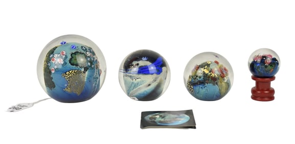 Four Josh Simpson 'Inhabited Planet' Glass Paperweights - Josh