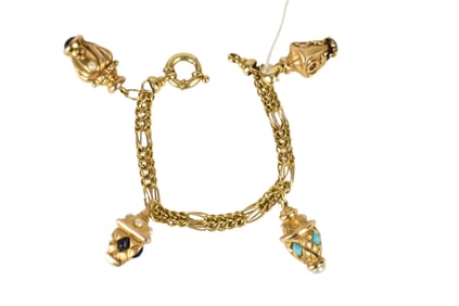 14K Yellow Gold Charm Bracelet with 4 Charms. Italy Length 7.5" wt. 23.2 grams. One of the charms
