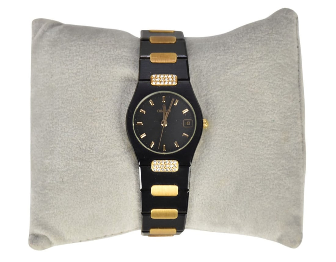 Ladies Concord 18K Gold Gun Metal Black SS Swiss Date Watch. 24mm with 3 extra links. Needs battery: Ladies Concord 18K Gold Gun Metal Black SS Swiss Date Watch. 24mm with 3 extra links. Needs battery