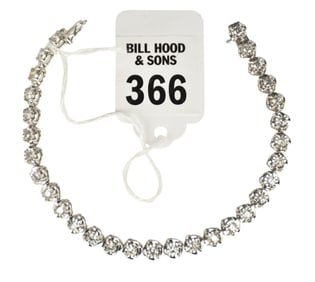10K White Gold Diamond Bracelet. Length 7.5" wt. 12.6 grams. There are 30 .01 round diamonds I1-2 F