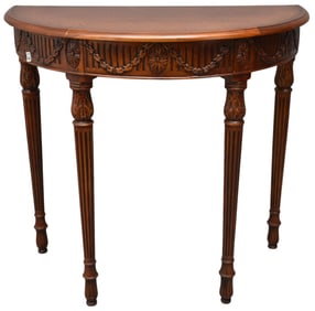 Theodore Alexander Demi-Lune Table with Faux Leather Top?  33"H x 35-1/2"w x 20" deep.