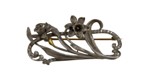 Art Deco Platinum Brooch Floral Motif with Diamond Accents. 2" x 1" wt. 16.6 grams