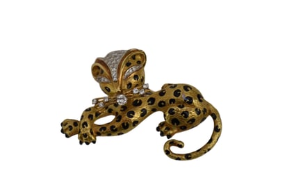 18K Yellow Gold Leopard with Diamond Accents. Wt. 31 grams 2.25" x 1.25" approx. 1 tcw SI i-2 G-H.