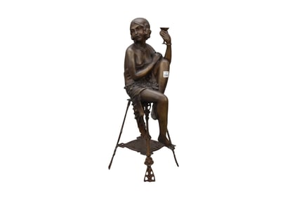 Large art deco bronze of a seated flapper holding a cup 28" high x 13" deep x 10.5" wide