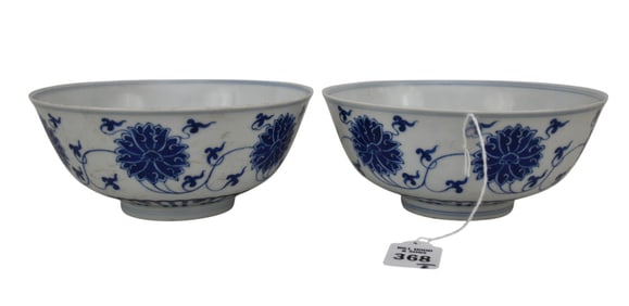 Pair Chinese Blue & White Porcelain 'Lotus' Bowls, Qianlong Mark - Two thin-walled porcelain bowls.