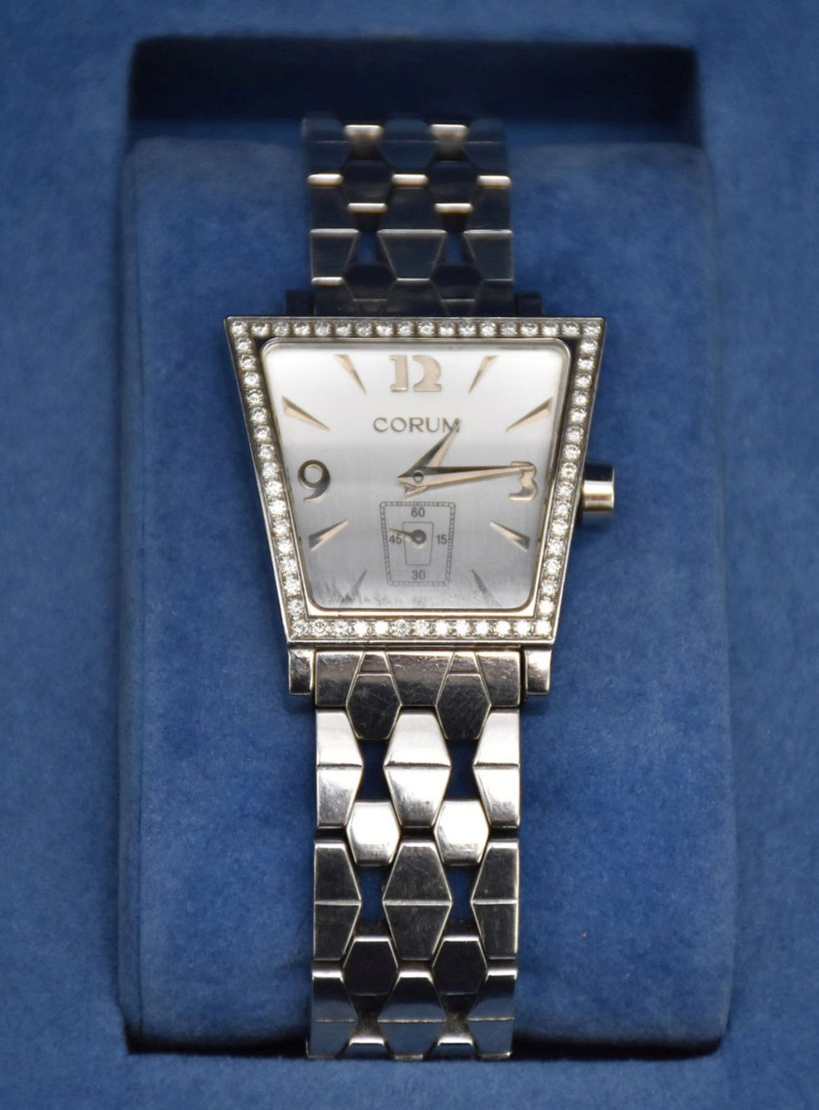 Corum Silver Stainless Steel Diamonds Trapeze Women's Wristwatch. 28 mm in working order. 6.5" inner: Corum Silver Stainless Steel Diamonds Trapeze Women's Wristwatch. 28 mm in working order. 6.5" inner circumference with 2.5" opening. Has extra links.