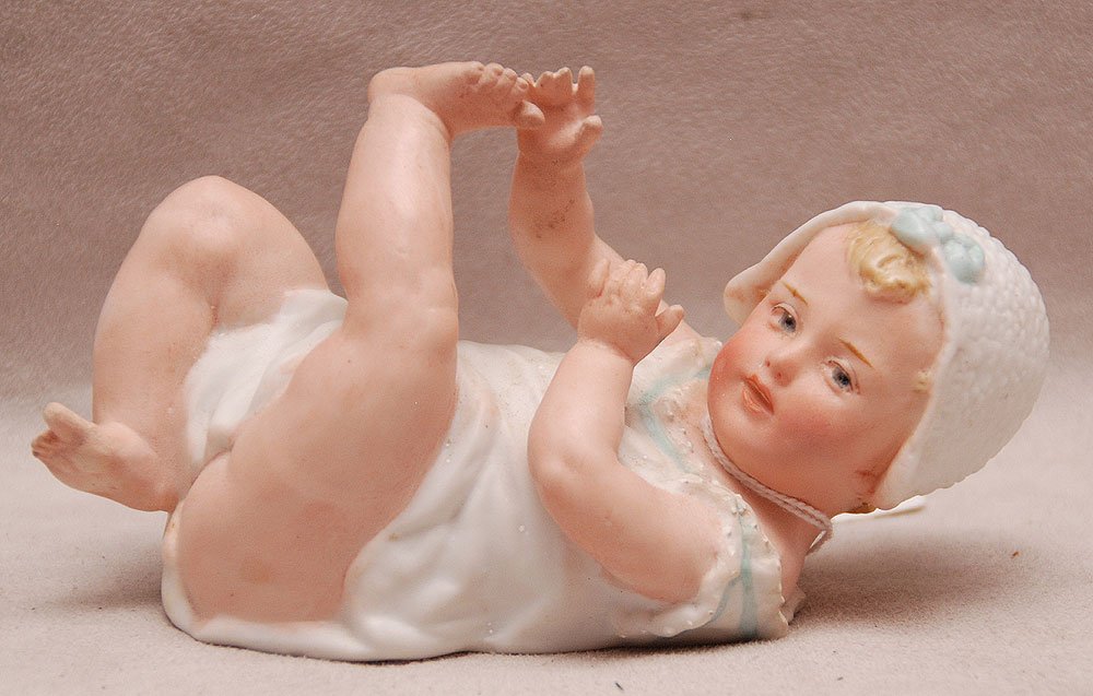 Huebach piano baby, 5"h: Huebach piano baby, 5"h