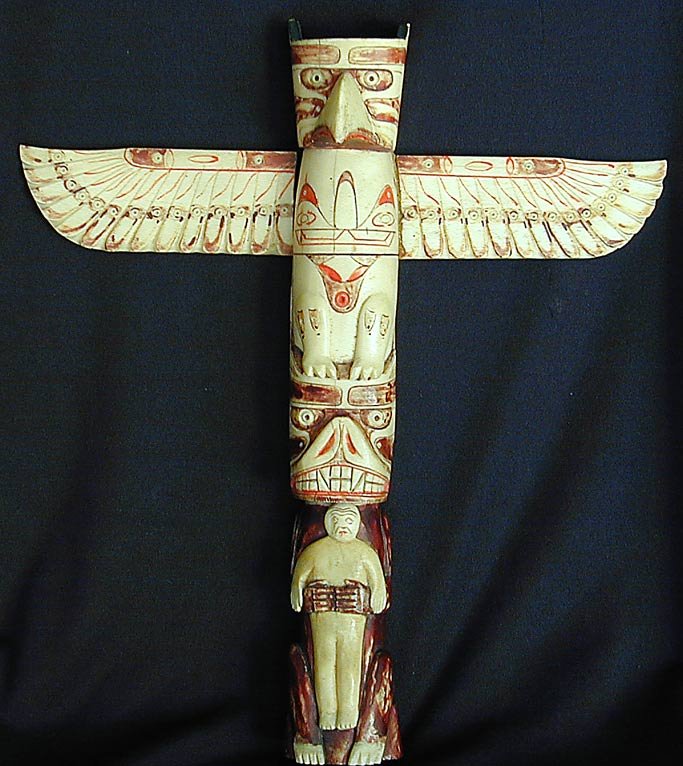 EARLY 20THC NW COAST POLYCHROME WALRUS TOTEM POLE 10"H : EARLY 20THC NW COAST POLYCHROME WALRUS TOTEM POLE 10"H A finely carved and painted circa 1920s Northwest Coast American Indian totem pole carved from walrus tusk and bone, 10"H x 9"W (wing span), very